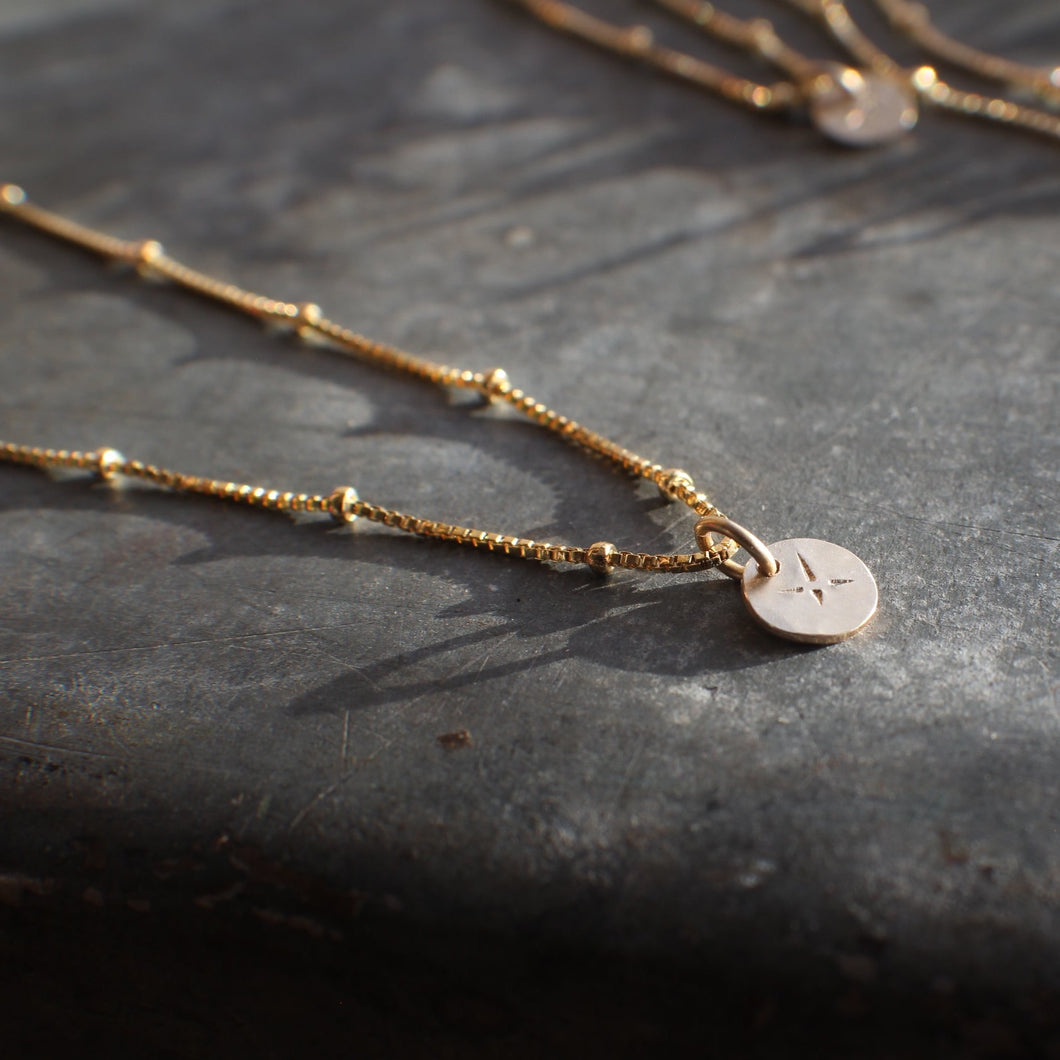 Gold Lumen Box Chain Necklace with teeny coin charm